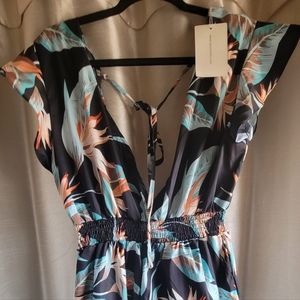 Romper with flowers low V. Size XL
